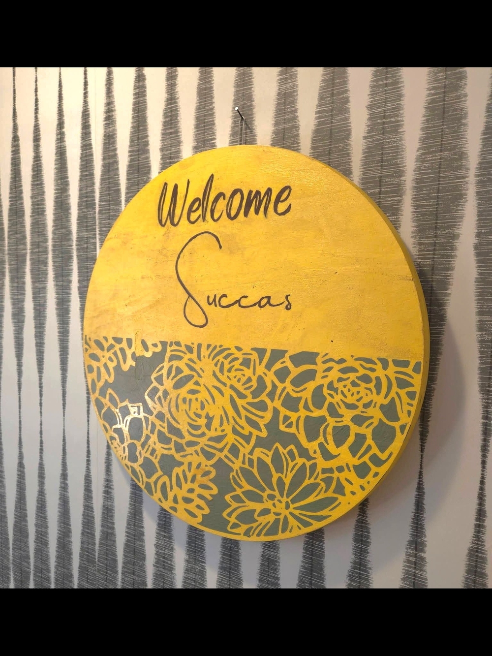 Welcome Succas Round Wall Sign in Yellow and Green